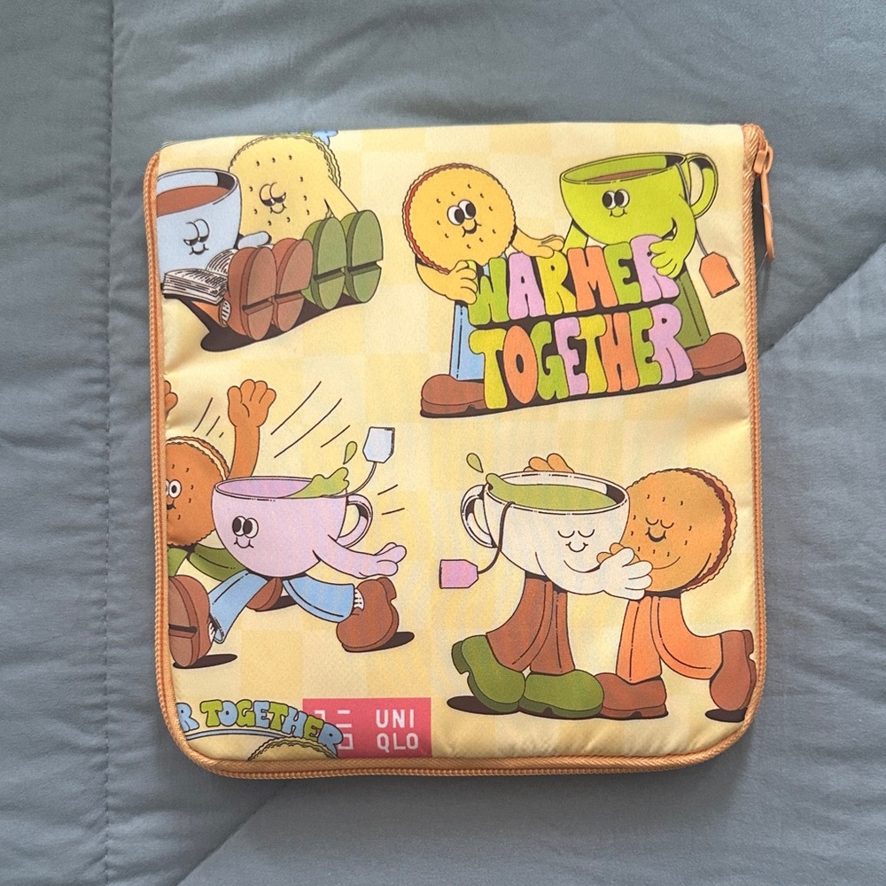 Uniqlo Warm Together Cartoon Pouch - Yellow and Orange